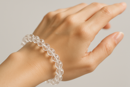 Clear Quartz Faceted Bracelet In Round Beads in women's hand HD Quality image 