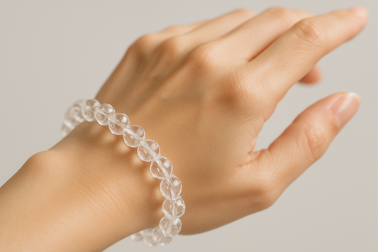 Clear Quartz Faceted Bracelet In Round Beads in women's hand HD Quality image 